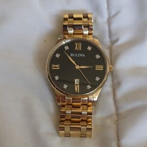 Bulova Luxurious Gold and Black Timepiece